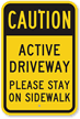 Active Driveway Please Stay On Sidewalk Sign