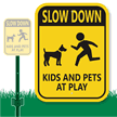 Slow Down Kids And Pets At Play Sign