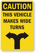 Caution, This Vehicle Makes Wide Turns Sign