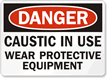 Danger Caustic Wear Protective Equipment Sign