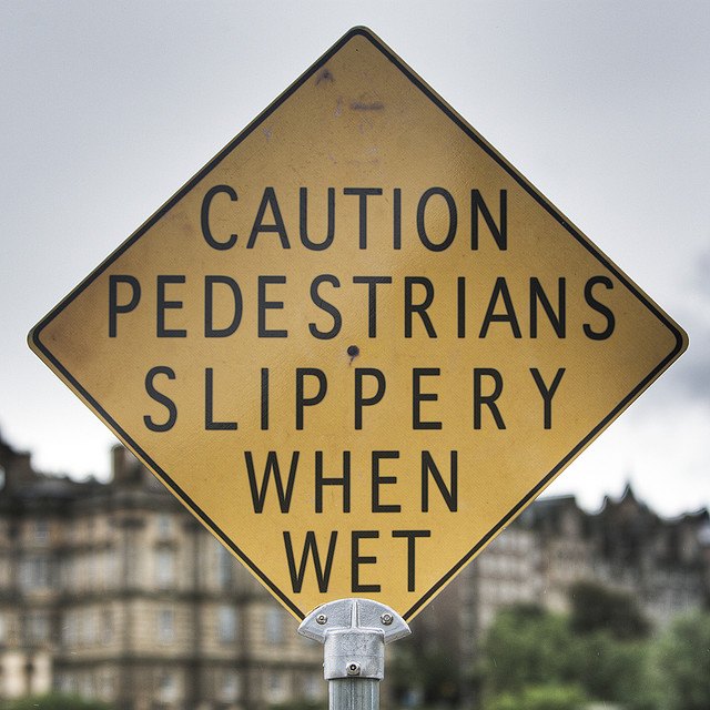Caution Pedestrians Slippery When Wet