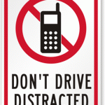 don't drive distracted sign