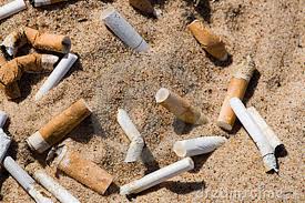 Cigarette butts in sand