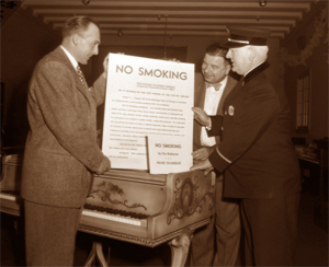 Marshall Fields posts No Smoking signs at his department store, 1948