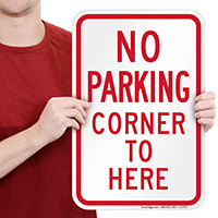 No Parking - Corner To Here Sign