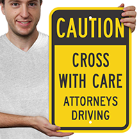 Cross With Care Attorneys Drive Caution Sign