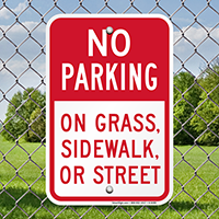 No Parking On Grass, Sidewalk, Or Street Sign