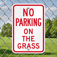 NO PARKING ON THE GRASS Sign