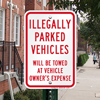 Illegally Parked Vehicles Towed Sign
