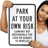PARK AT YOUR OWN RISK Sign