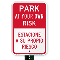 Park At Own Risk Bilingual Sign