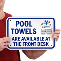 Pool Towels Available at Front Desk Sign