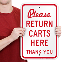 PLEASE RETURN CARTS HERE Sign