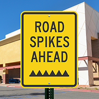 Road Spikes Ahead Sign
