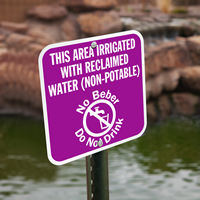Bilingual Area Irrigated With Reclaimed Water Sign
