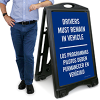 Bilingual Drivers Remain in Vehicle Sidewalk Sign