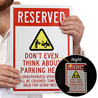 Reserved No Parking Here Sign