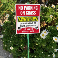 No Parking On Grass Violators Towed Surveillance Sign