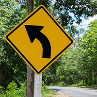 Left Curve Symbol - Traffic Sign